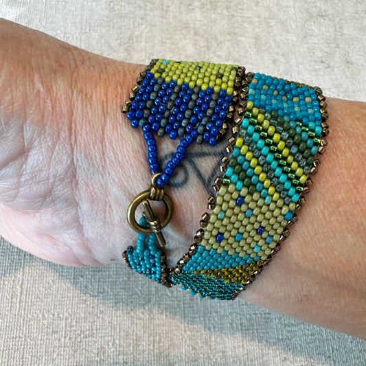 P118 Pulsera Sinfonía Textil