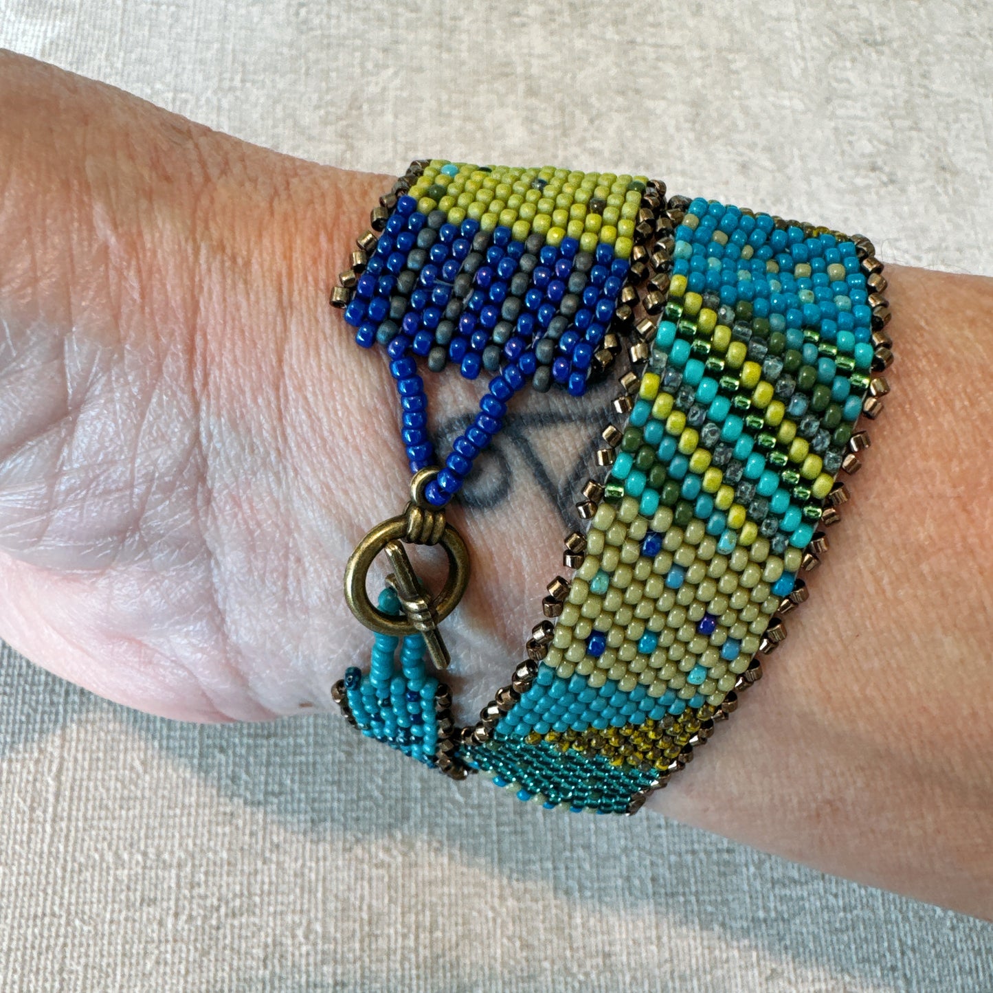 P118 Pulsera Sinfonía Textil