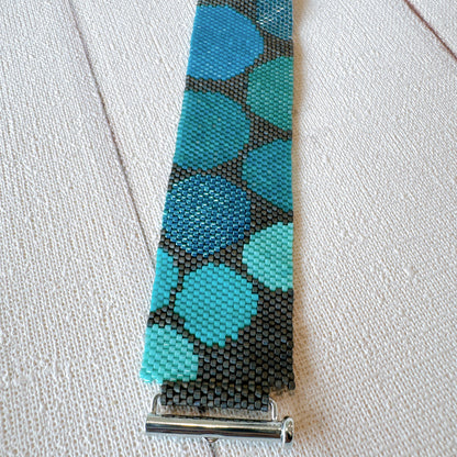 P123 Pulsera Geometría Flotante