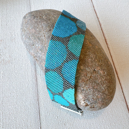 P123 Pulsera Geometría Flotante