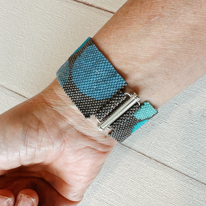 P123 Pulsera Geometría Flotante