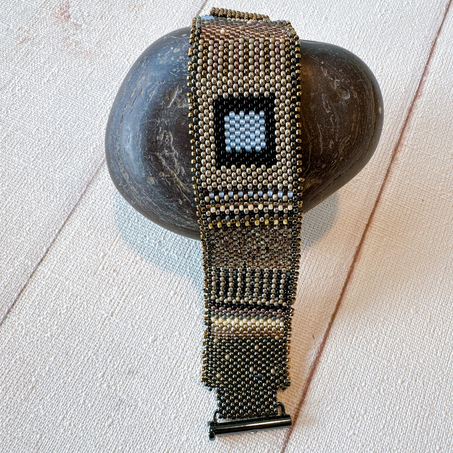 P120 Pulsera Ecos de Acero