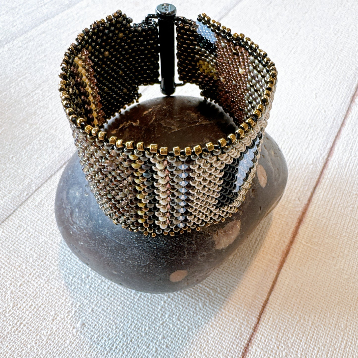 P120 Pulsera Ecos de Acero