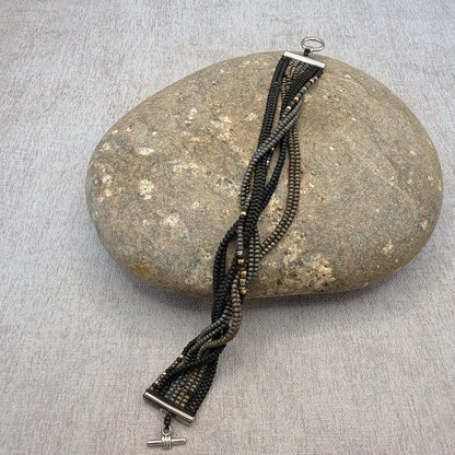 P102 Pulsera Trenza de Humo
