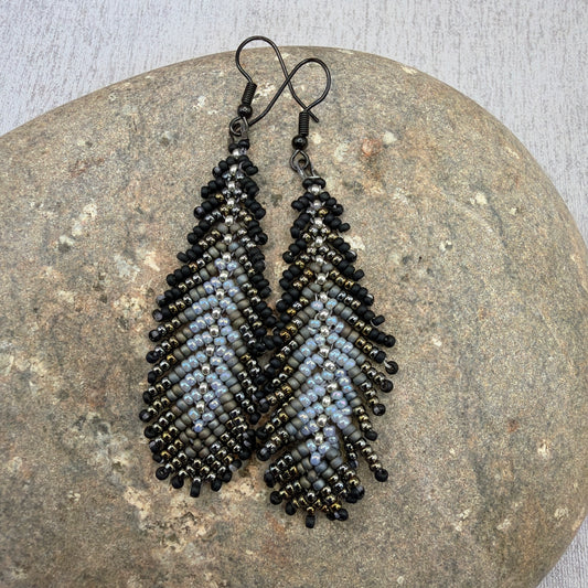 E083 Pluma Humo