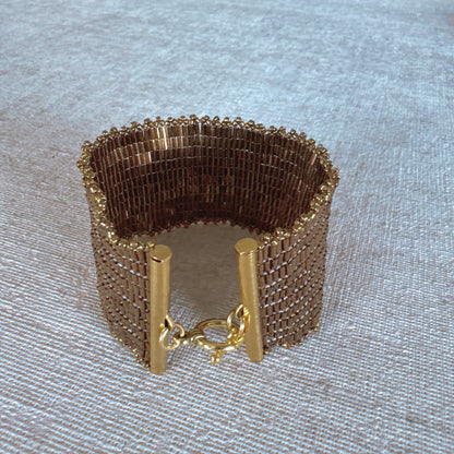 P111 Pulsera Tierra Brillante