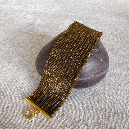 P111 Pulsera Tierra Brillante